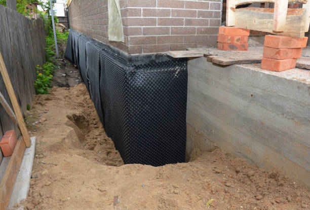 Happy homeowners after waterproofing job in Flagtown